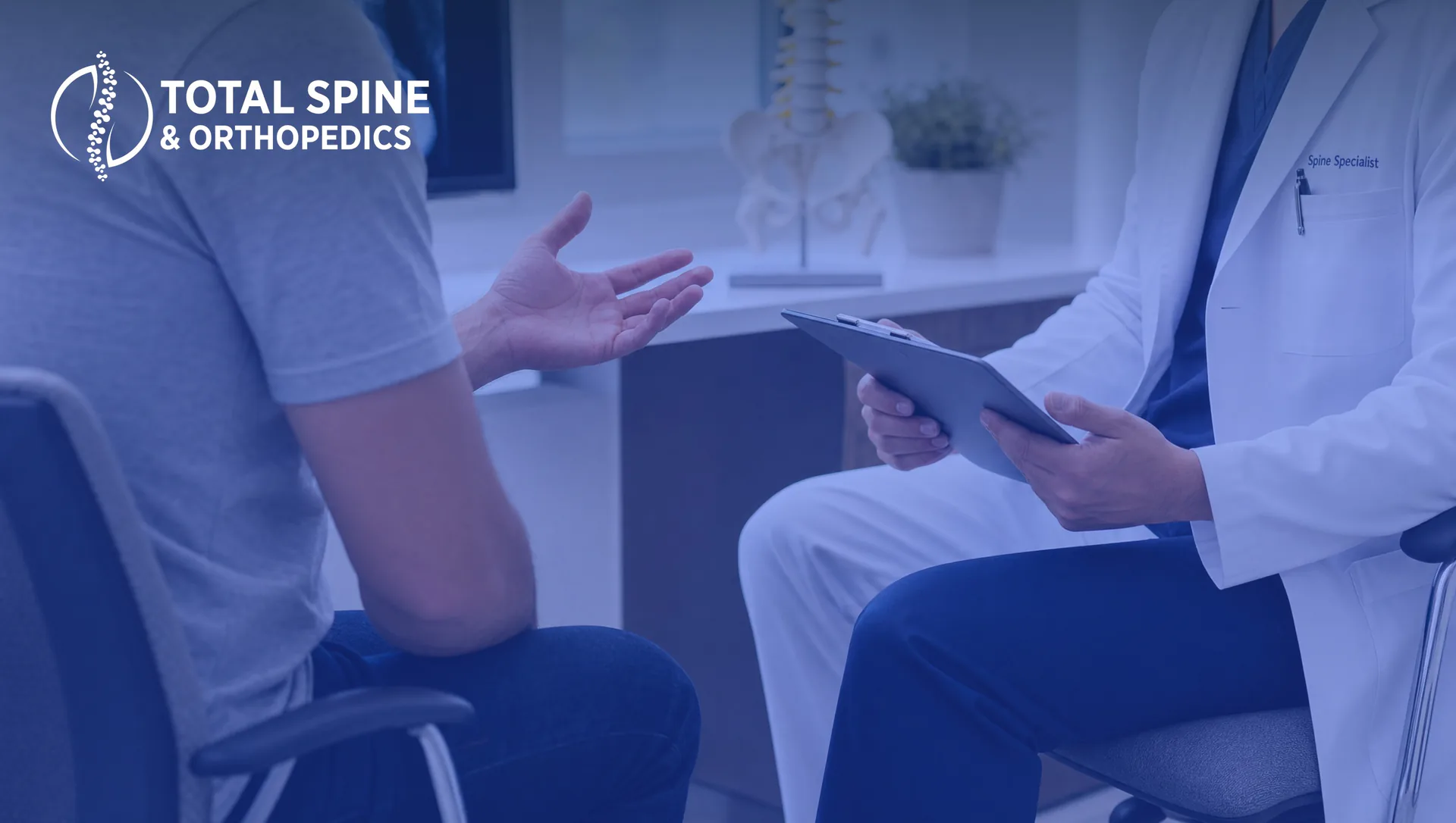 Patient asking a spine surgeon questions during a consultation